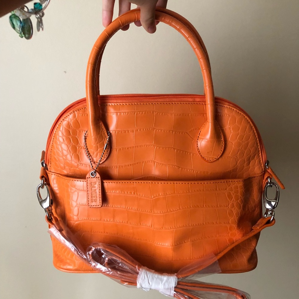 Brand new Danier orange leather purse